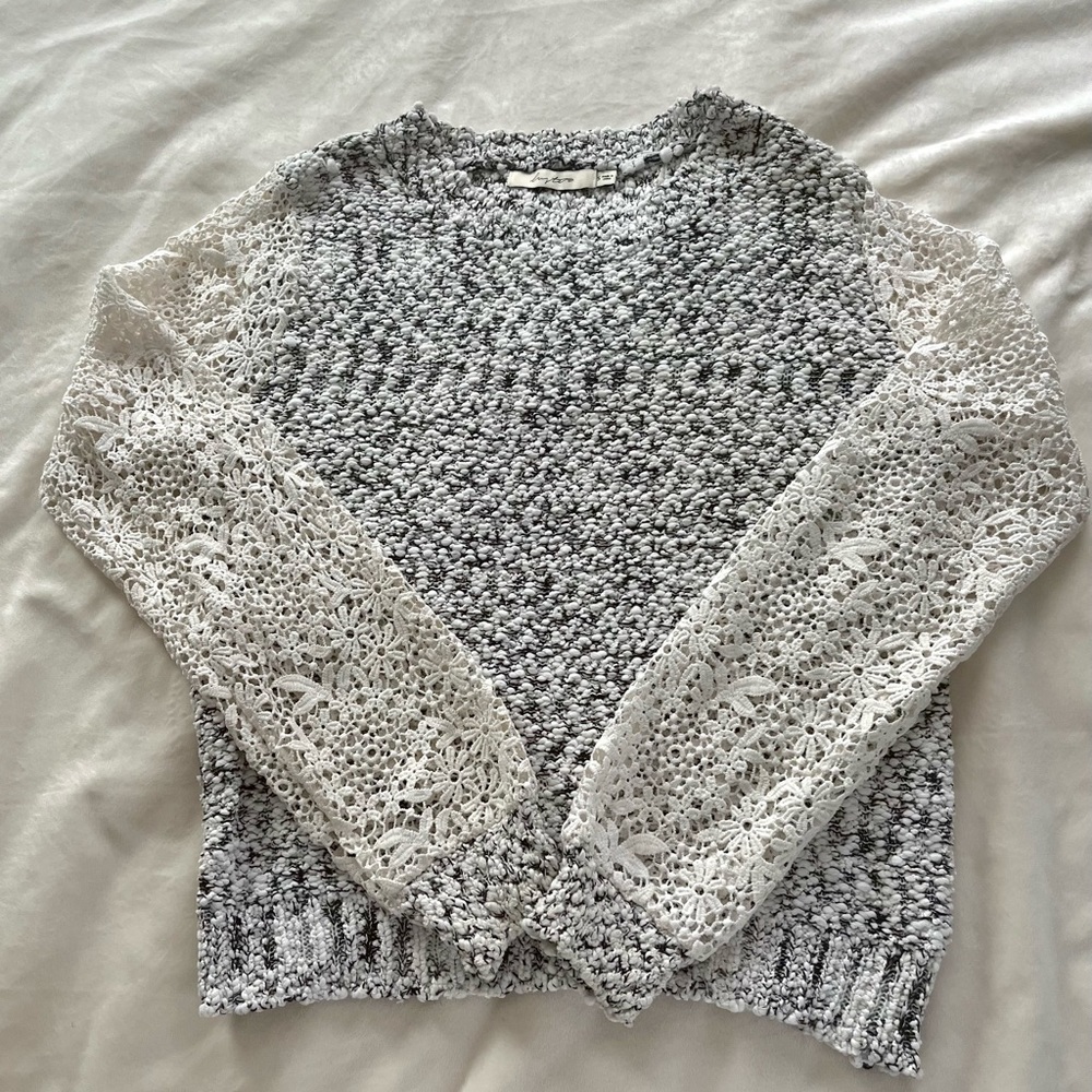 “Luster” Black and White knit sweater with lace sleeves